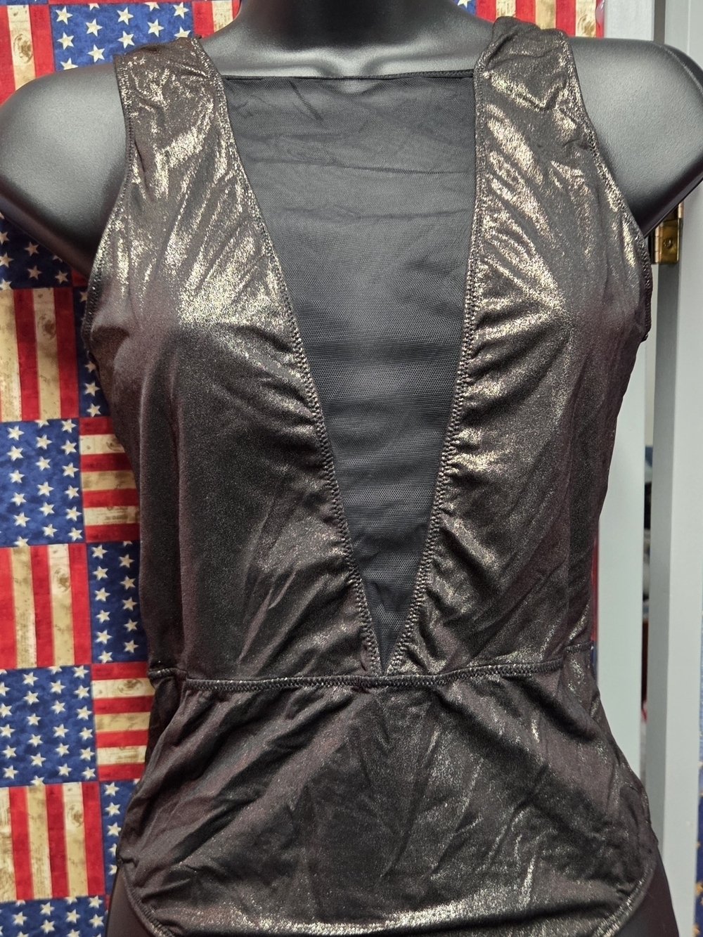 **Victoria's Secret Black Bodysuit with Golden Shimmer Color.**
